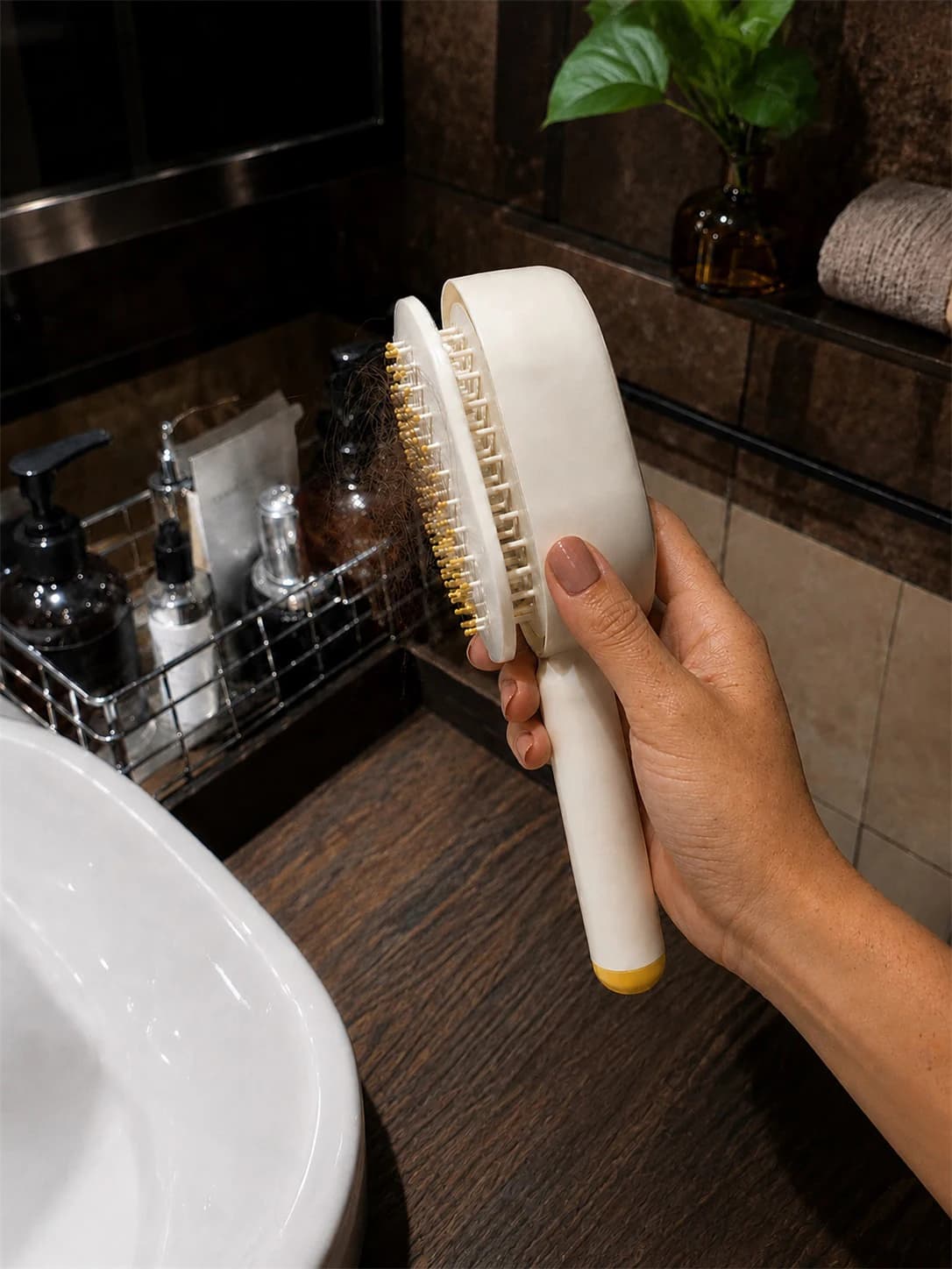 Photo from this review of Trackify Premium Elecspray Hair Brush